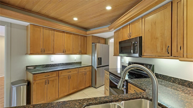 kitchen with light tile patterned flooring, dark stone countertops, wood ceiling, and appliances with stainless steel finishes