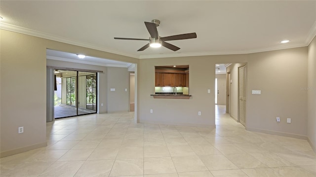 empty room with light tile patterned floors, ceiling fan, and ornamental molding