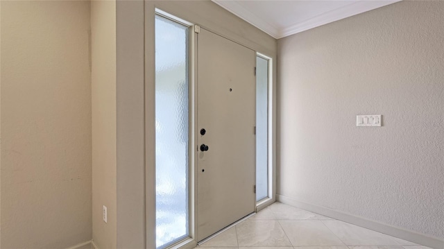 doorway featuring plenty of natural light, light tile patterned floors, and crown molding