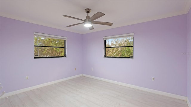 unfurnished room with ceiling fan and light hardwood / wood-style flooring