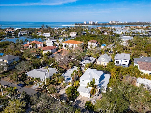 drone / aerial view with a water view