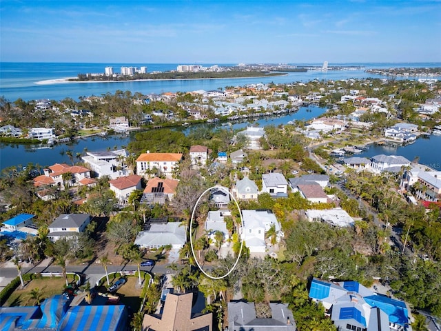 bird's eye view with a water view