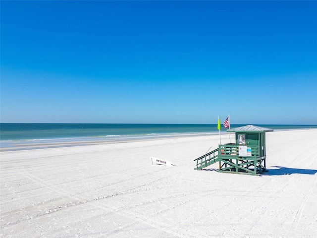 view of water feature with a beach view