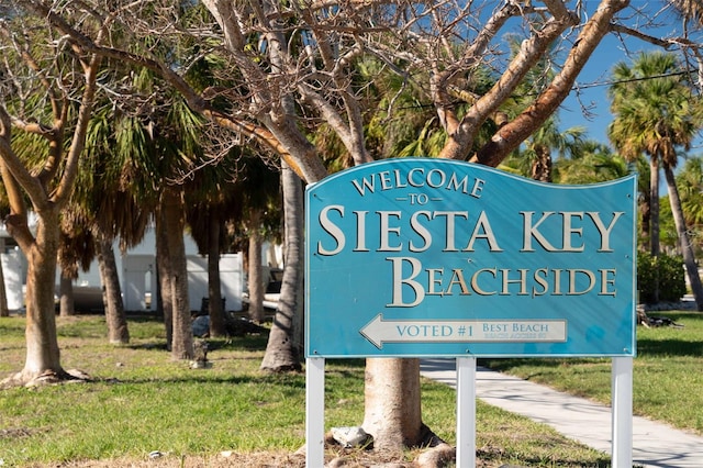 4189 Roberts Point Cir, Sarasota, FL 34242 - community / neighborhood sign featuring a lawn and a carport