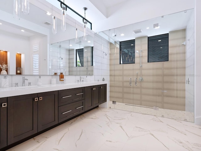 bathroom with vanity and an enclosed shower