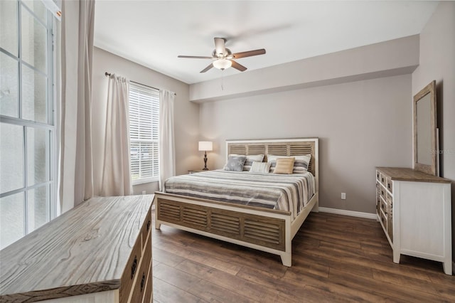 bedroom featuring ceiling fan and dark hardwood / wood-style flooring