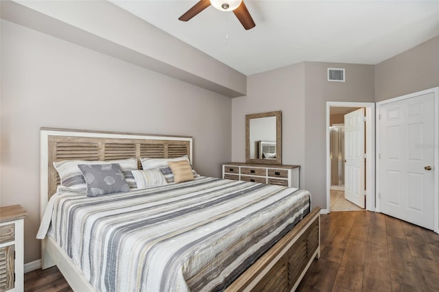 bedroom featuring ceiling fan and dark hardwood / wood-style floors