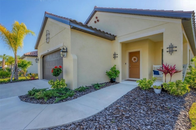 view of front of property featuring a porch and a garage