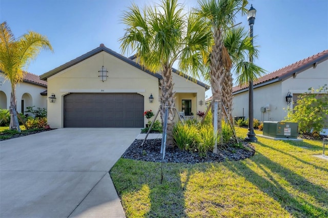 mediterranean / spanish-style house featuring central AC, a garage, and a front lawn