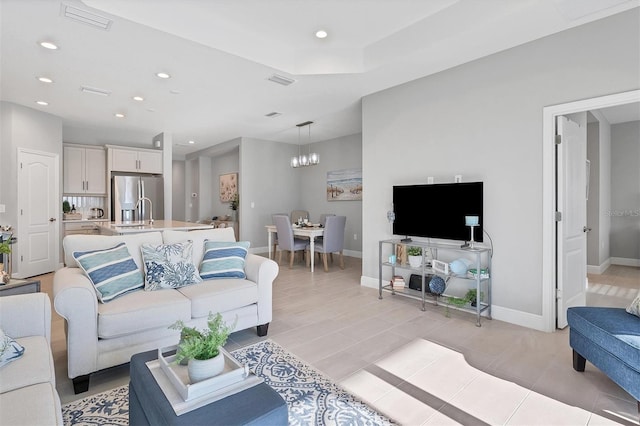 364 Palmaria Ct, Nokomis, FL 34275 - living room featuring recessed lighting and light tile patterned floors