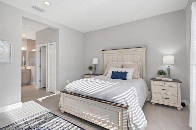 364 Palmaria Ct, Nokomis, FL 34275 - bedroom with baseboards and ensuite bath