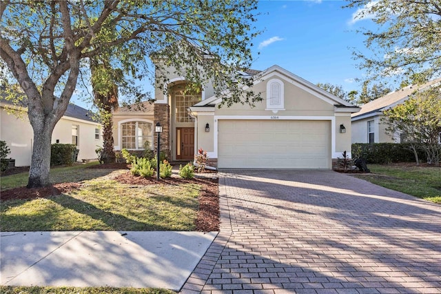 view of front of property featuring a garage