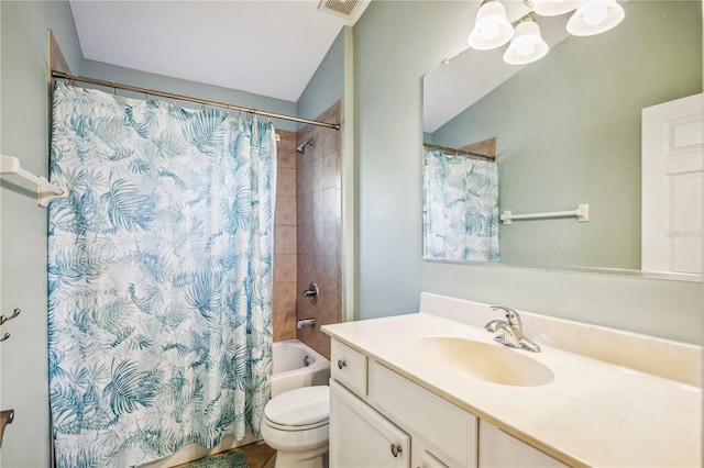 full bathroom featuring vanity, shower / bath combination with curtain, toilet, and vaulted ceiling