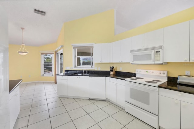 kitchen with white cabinets, white appliances, and sink