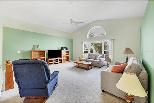 carpeted living room featuring ceiling fan and lofted ceiling