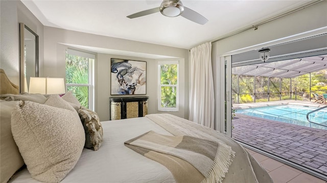 bedroom with access to exterior and ceiling fan