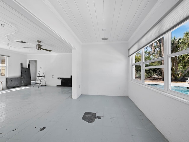 611 Hibiscus Way, Longboat Key, FL 34228 - unfurnished room featuring visible vents, ornamental molding, a ceiling fan, and wood ceiling