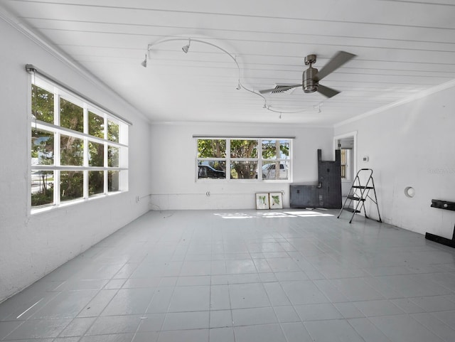 611 Hibiscus Way, Longboat Key, FL 34228 - unfurnished sunroom featuring rail lighting