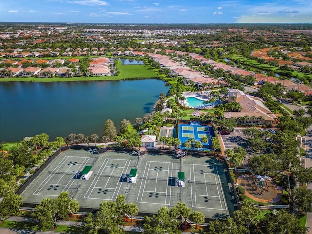 drone / aerial view with a water view