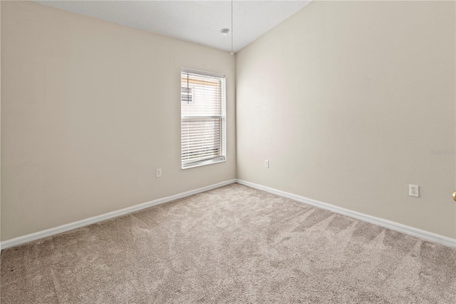 empty room with carpet flooring