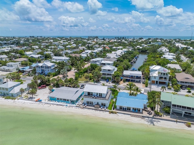 bird's eye view with a view of the beach and a water view