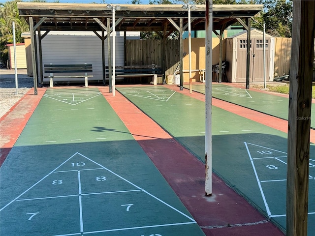 surrounding community with a storage shed