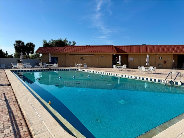 view of pool with a patio