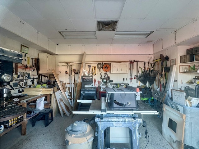 garage with a workshop area