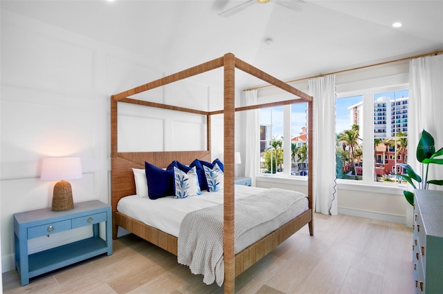 bedroom featuring light hardwood / wood-style flooring and ceiling fan