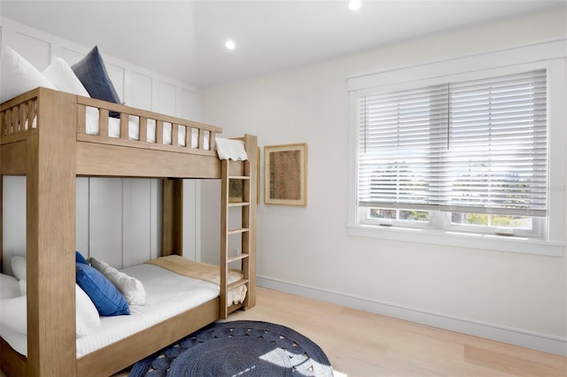 bedroom with wood-type flooring