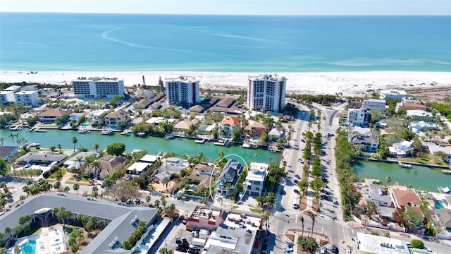 aerial view with a beach view and a water view