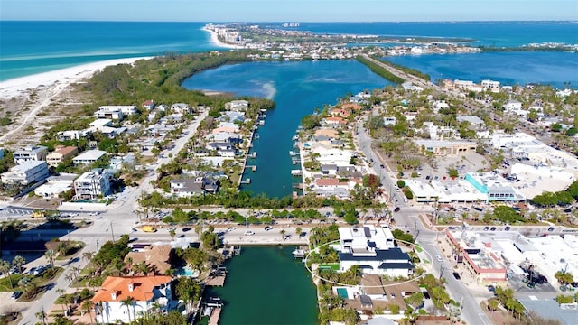 aerial view featuring a water view and a view of the beach