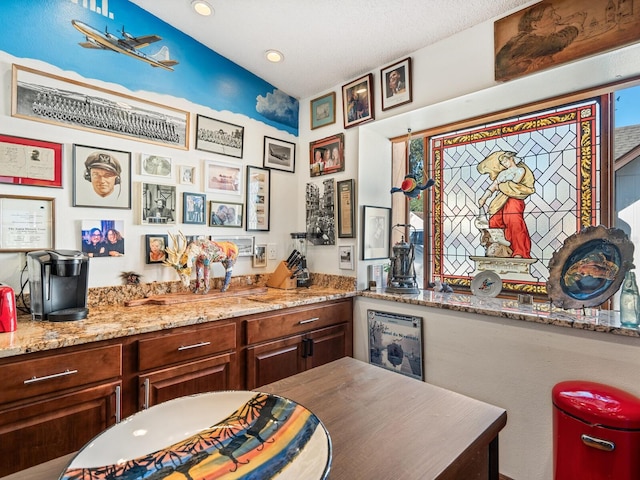 interior space featuring light stone countertops