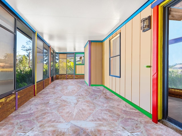 3888 Shady Brook Ln, Sarasota, FL 34243 - unfurnished sunroom featuring plenty of natural light