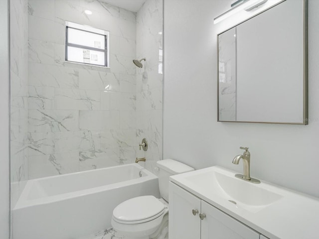 full bathroom with toilet, tiled shower / bath, and vanity