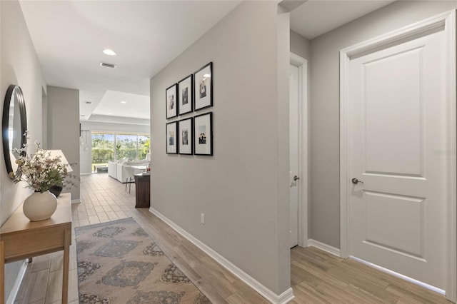 hallway featuring light hardwood / wood-style flooring