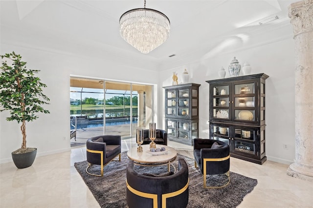 sitting room with crown molding and a notable chandelier