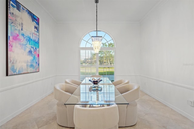 dining space with crown molding and light tile patterned floors