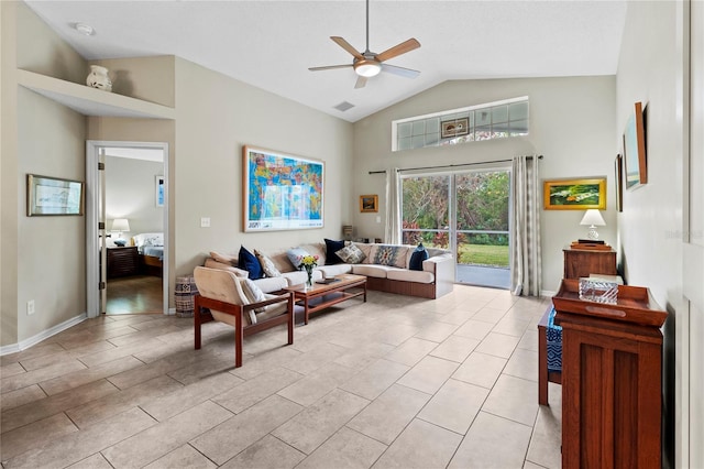 living room featuring ceiling fan and lofted ceiling