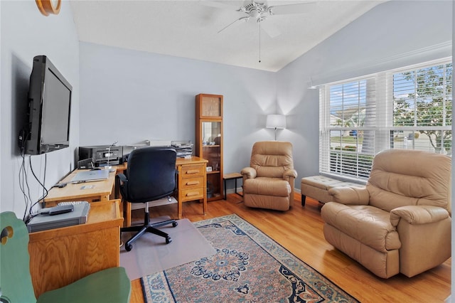 office featuring ceiling fan, lofted ceiling, and hardwood / wood-style flooring