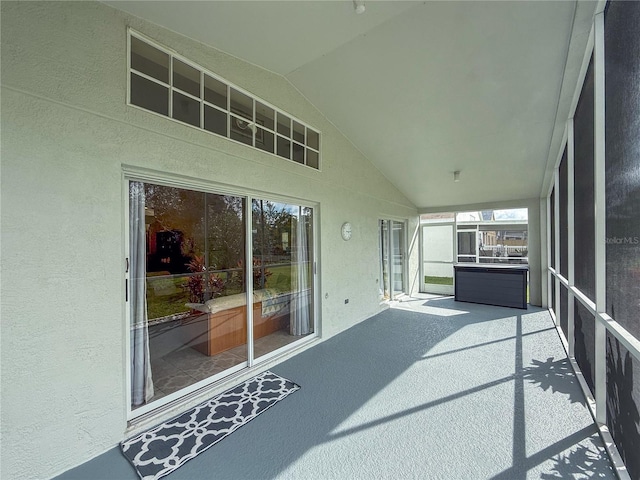 sunroom with vaulted ceiling