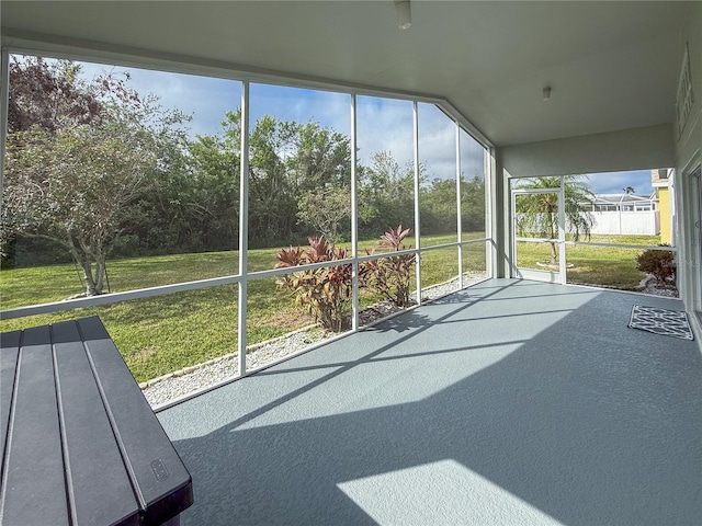 unfurnished sunroom with a healthy amount of sunlight