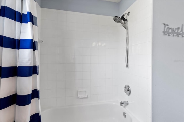 bathroom featuring shower / bath combination with curtain