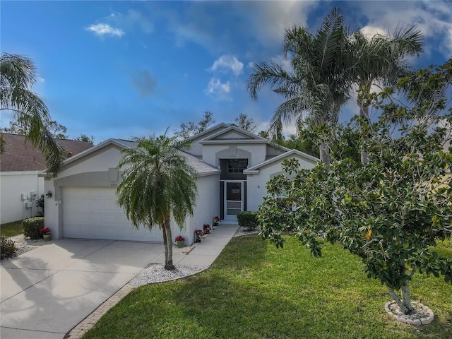 view of front of home featuring a garage and a front yard