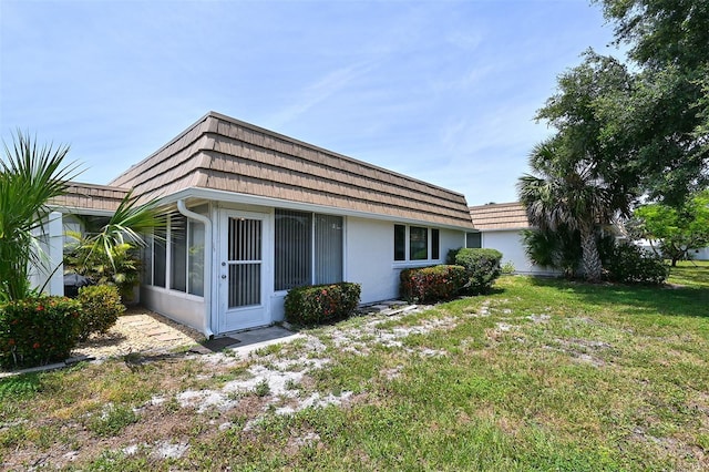 exterior space featuring a yard