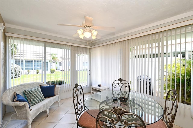 sunroom / solarium with ceiling fan