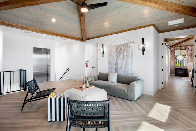 living room with lofted ceiling with beams, ceiling fan, elevator, and light parquet flooring