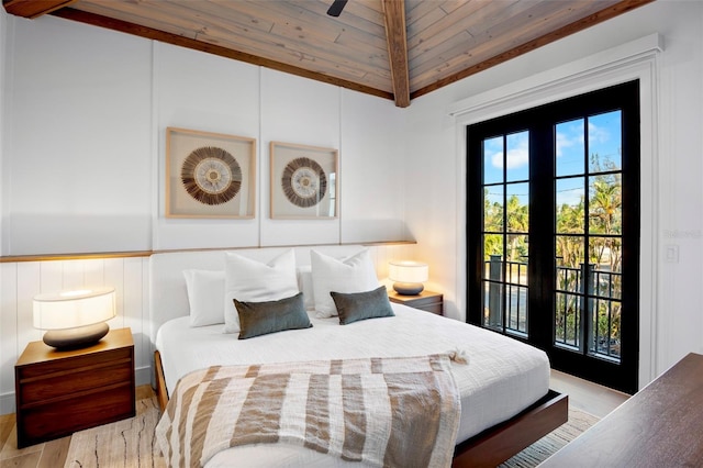 bedroom with access to exterior, wooden ceiling, vaulted ceiling, and light hardwood / wood-style floors