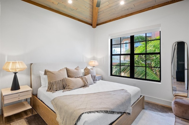 bedroom featuring wood-type flooring, wood ceiling, and vaulted ceiling