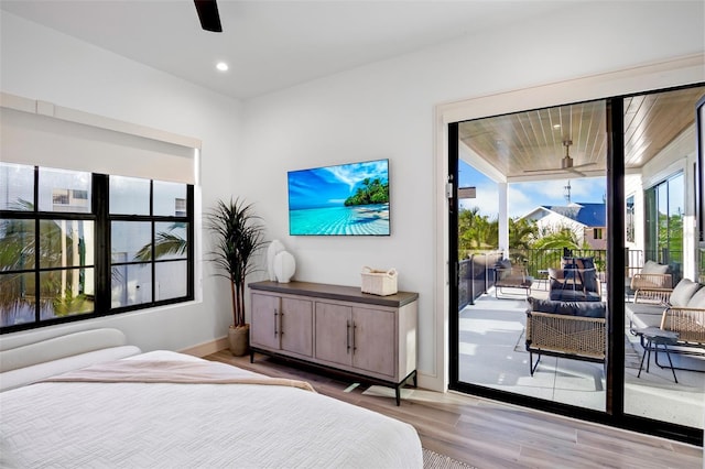 bedroom with ceiling fan, access to outside, and light hardwood / wood-style flooring